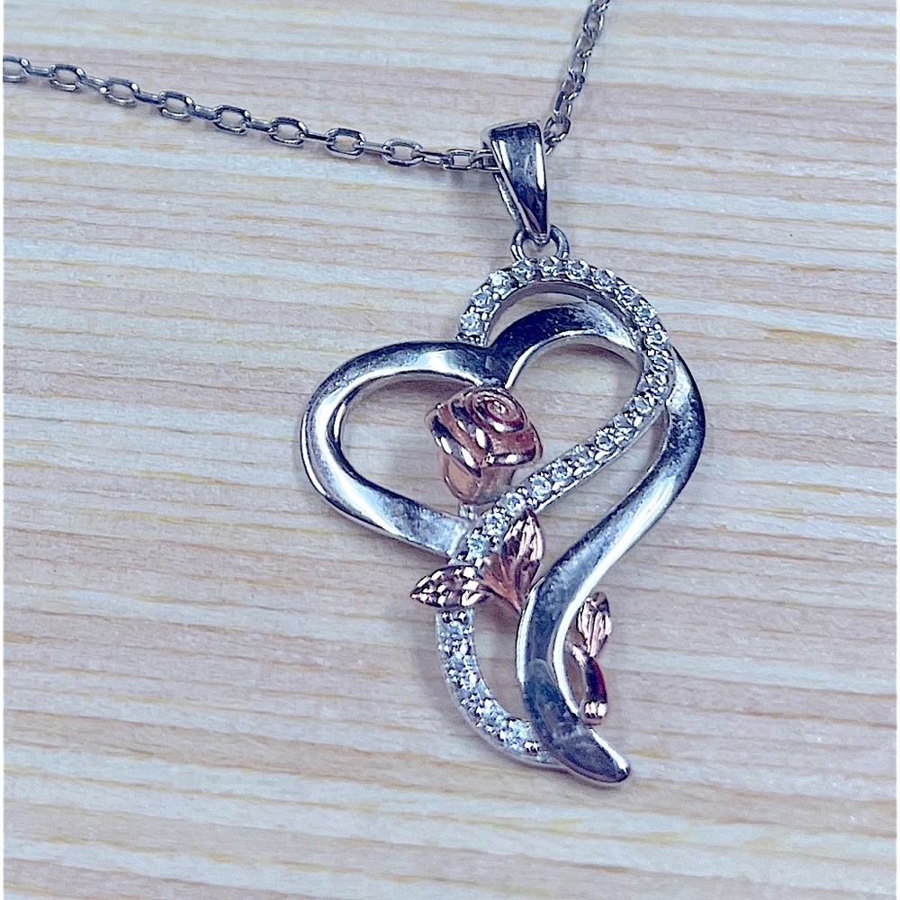 Heart shaped necklace with rose